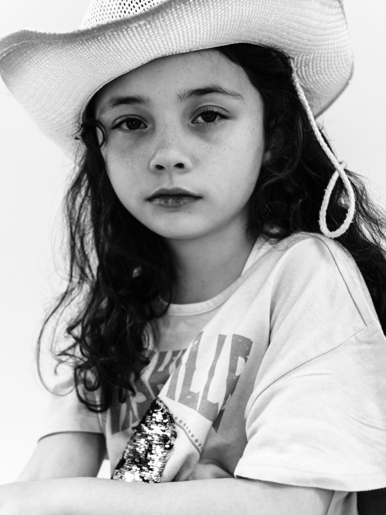  Grid of Buffalo personality portraits showing five different children's unique characters in timeless black and white