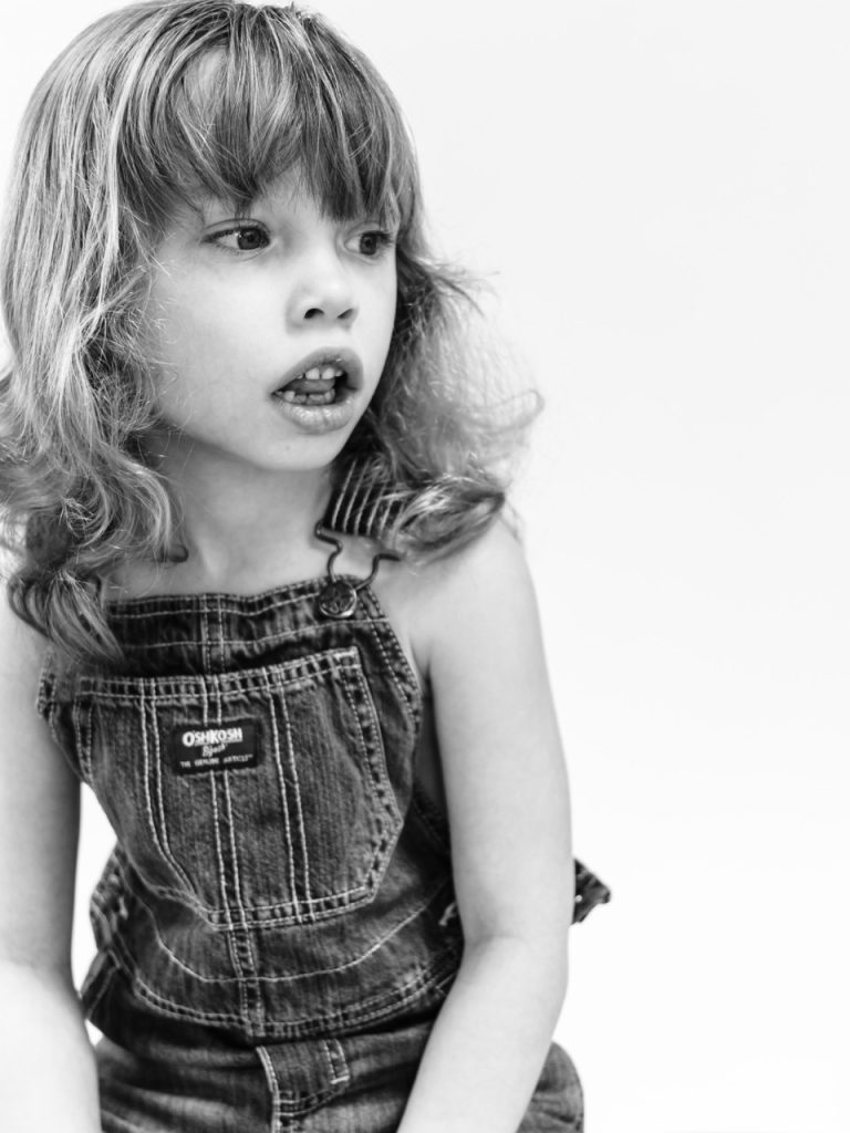  Grid of Buffalo personality portraits showing five different children's unique characters in timeless black and white