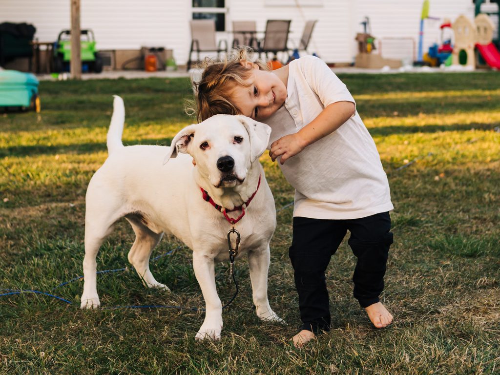  Documentary family photographer Buffalo NY specializing in authentic natural family portraits with pets too