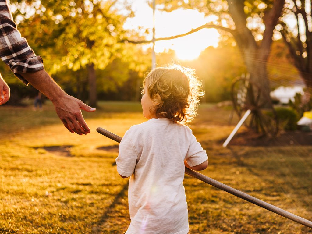 Golden hour family photography Buffalo NY showing warm natural light during documentary session