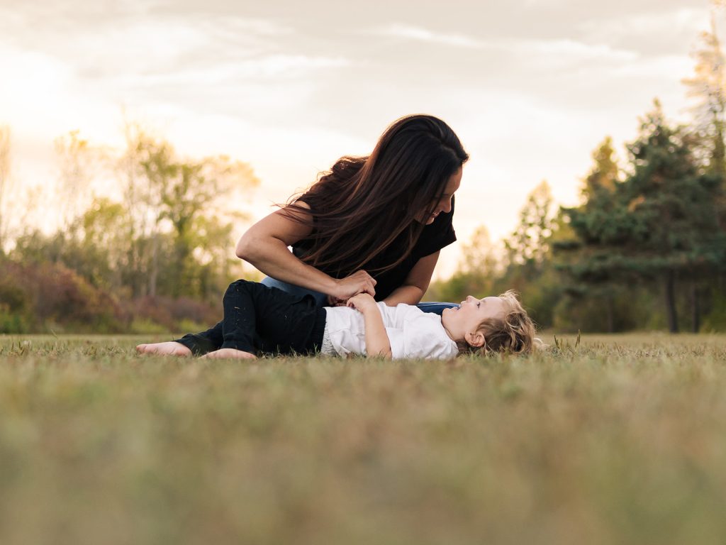  Documentary style family photographer Buffalo capturing candid moments during session
