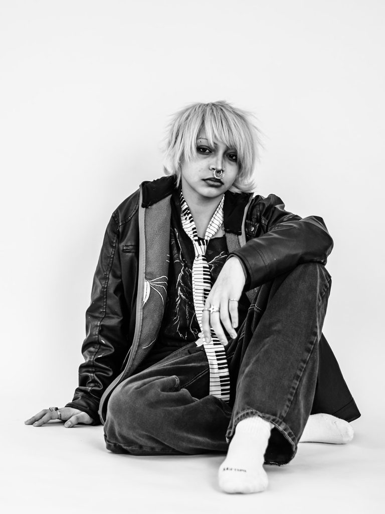 Thoughtful expression on child during individual personality portrait session